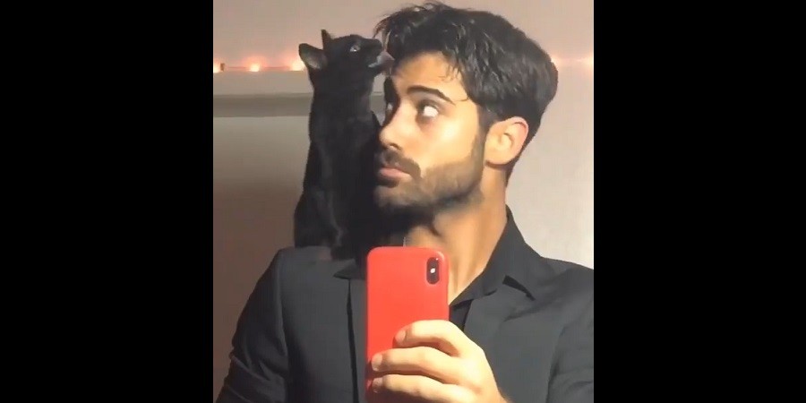 Dedicated Cat Helps Dad Prepare for his Date