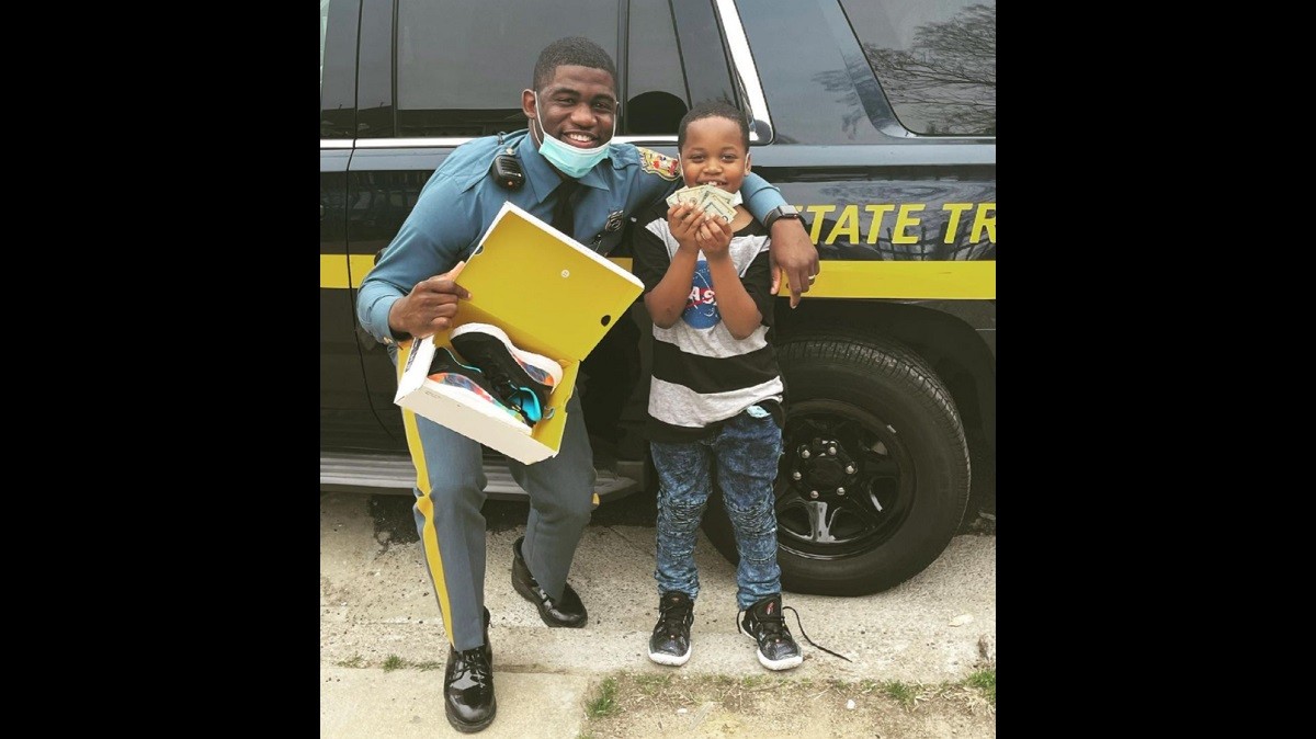 Cop Gives Biggest Little Supporter a New Pair of Basketball Shoes