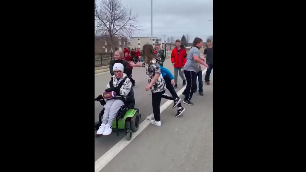 6th-Grader with Cerebral Palsy Scores Touchdown with the Help of Classmates