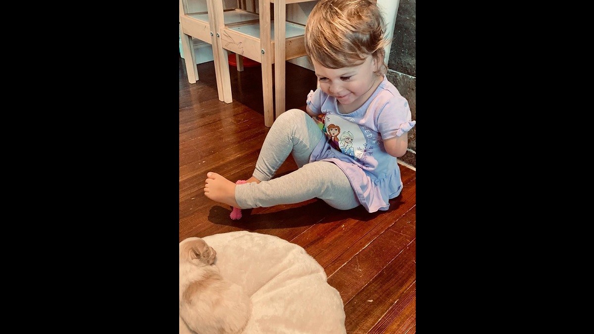 Toddler Born Without Hands Meets Puppy Without Paw