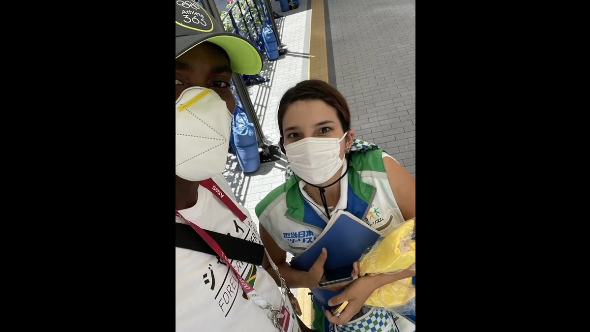 Jamaican gold medalist reunites with volunteer who helped him find his way to his Olympic race